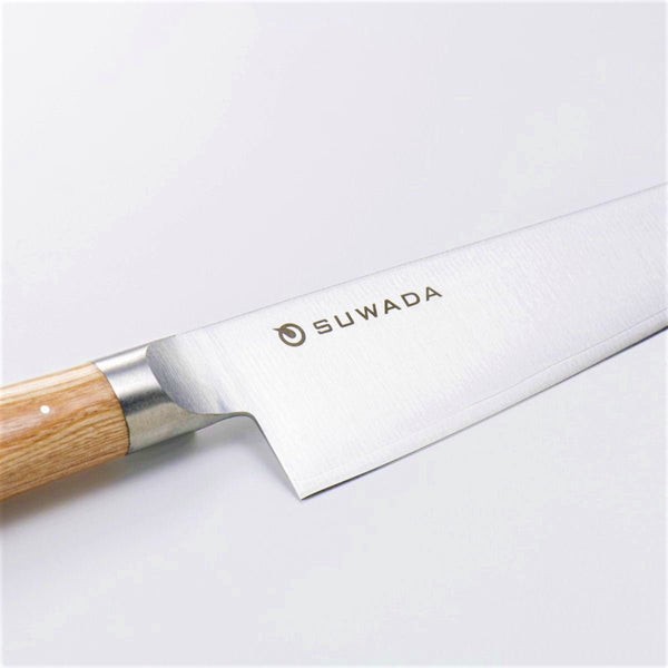 Japanese Gyuto kitchen knife with visible steel blade finish