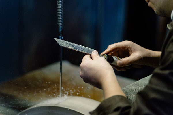 210 mm Gyuto kitchen knife with a Japanese-style wooden handle