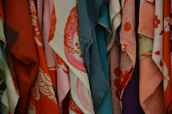 Patterned vintage kimono textiles illustrating the textile traditions behind tea utensil pouches