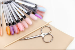 Small metal manicure tools arranged together