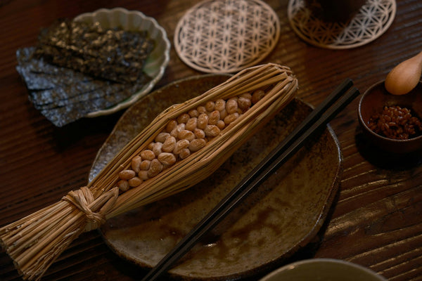 Japanese table set with multiple dishes and bowls