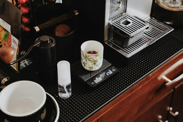 Brewed coffee on a digital scale during preparation