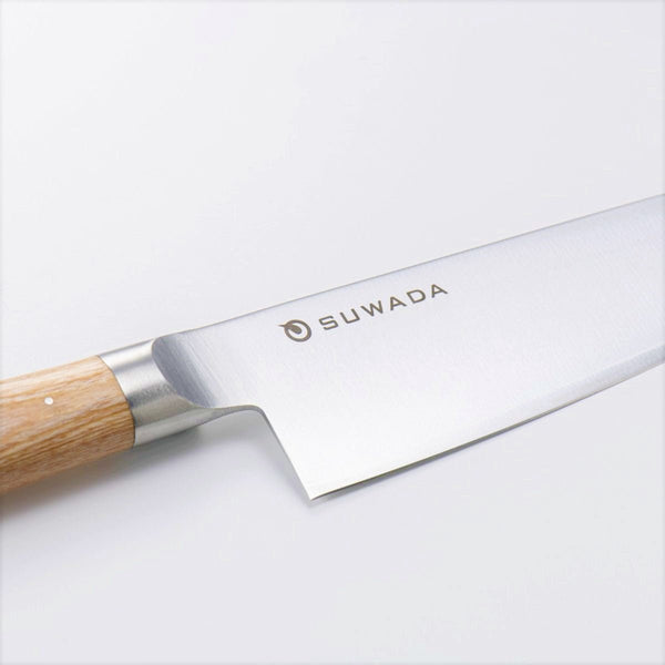 Japanese Santoku kitchen knife with the cutting edge clearly visible