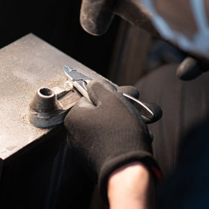 Japanese craftsperson working by hand